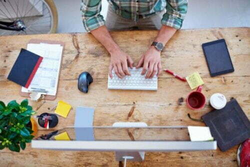 man writing business blog to supercharge lead magnets